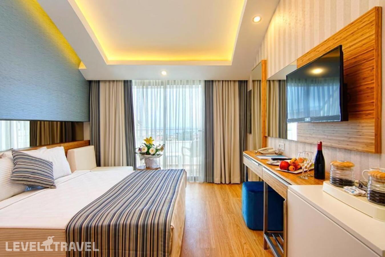 фотографии номера Стандартный номер отеля Dosinia Luxury Resort в Турция(Бельдиби) - фото №2