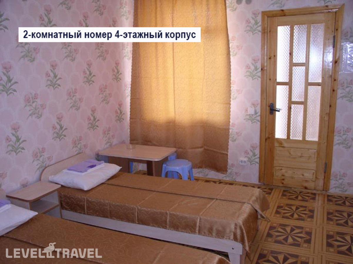 фотографии номера Четырехместный номер отеля База Отдыха Прибой в Россия(город Саки) - фото №1