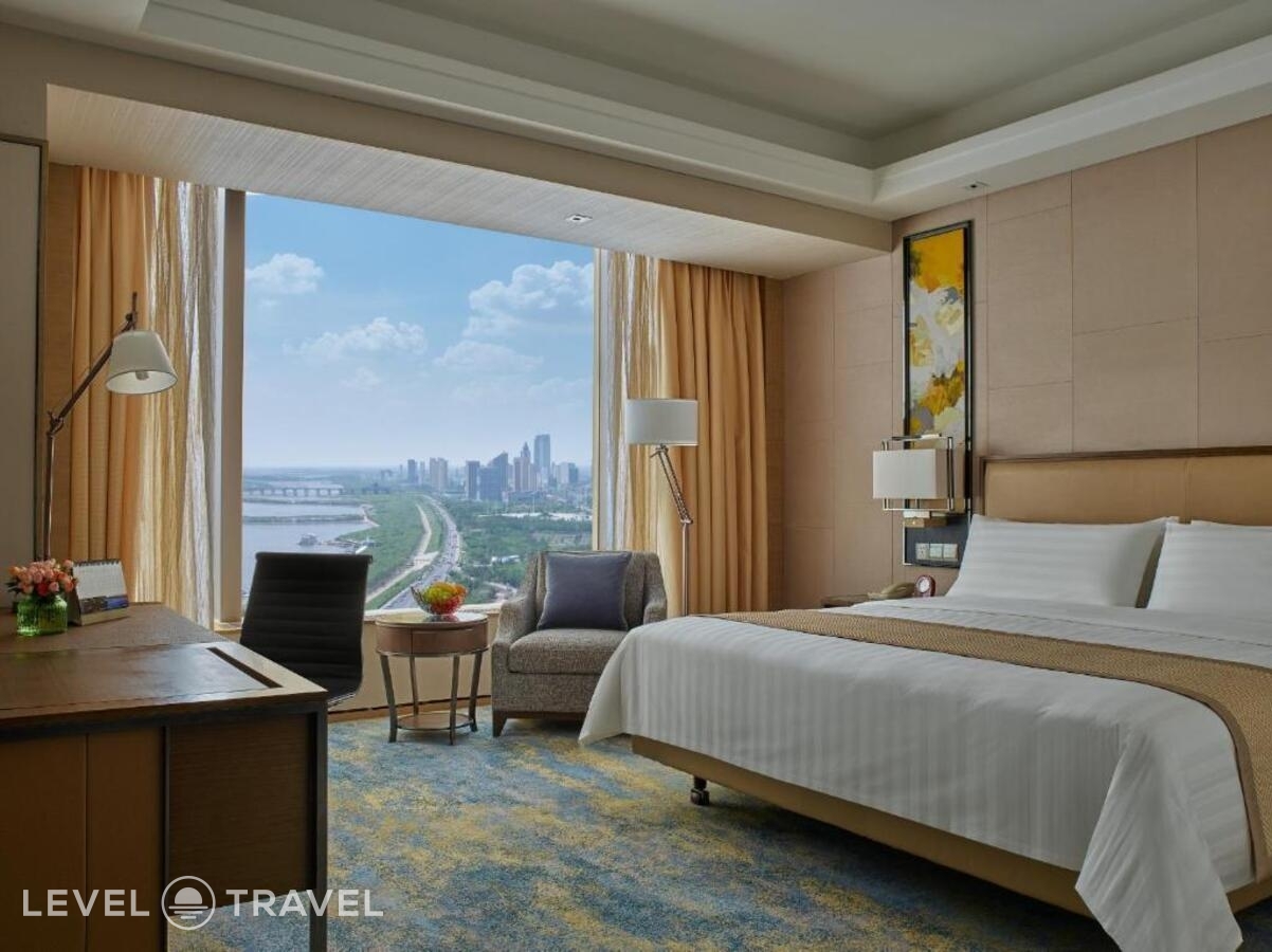 фотографии номера Двухместный номер Horizon Deluxe двуспальная кровать отеля Shangri-La Songbei, Harbin в Китай(Харбин) - фото №4