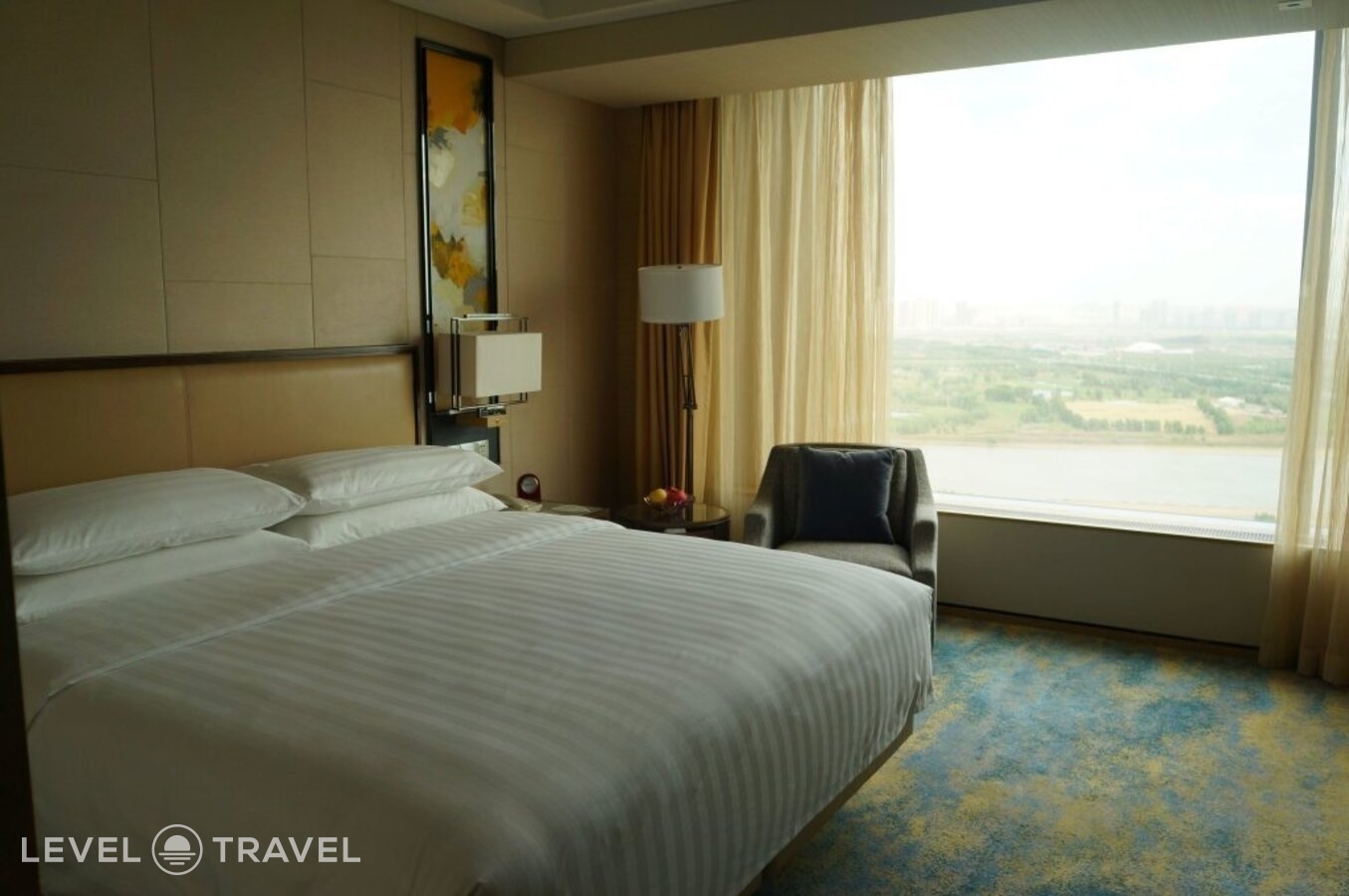 фотографии номера Двухместный номер Horizon Deluxe двуспальная кровать отеля Shangri-La Songbei, Harbin в Китай(Харбин) - фото №1