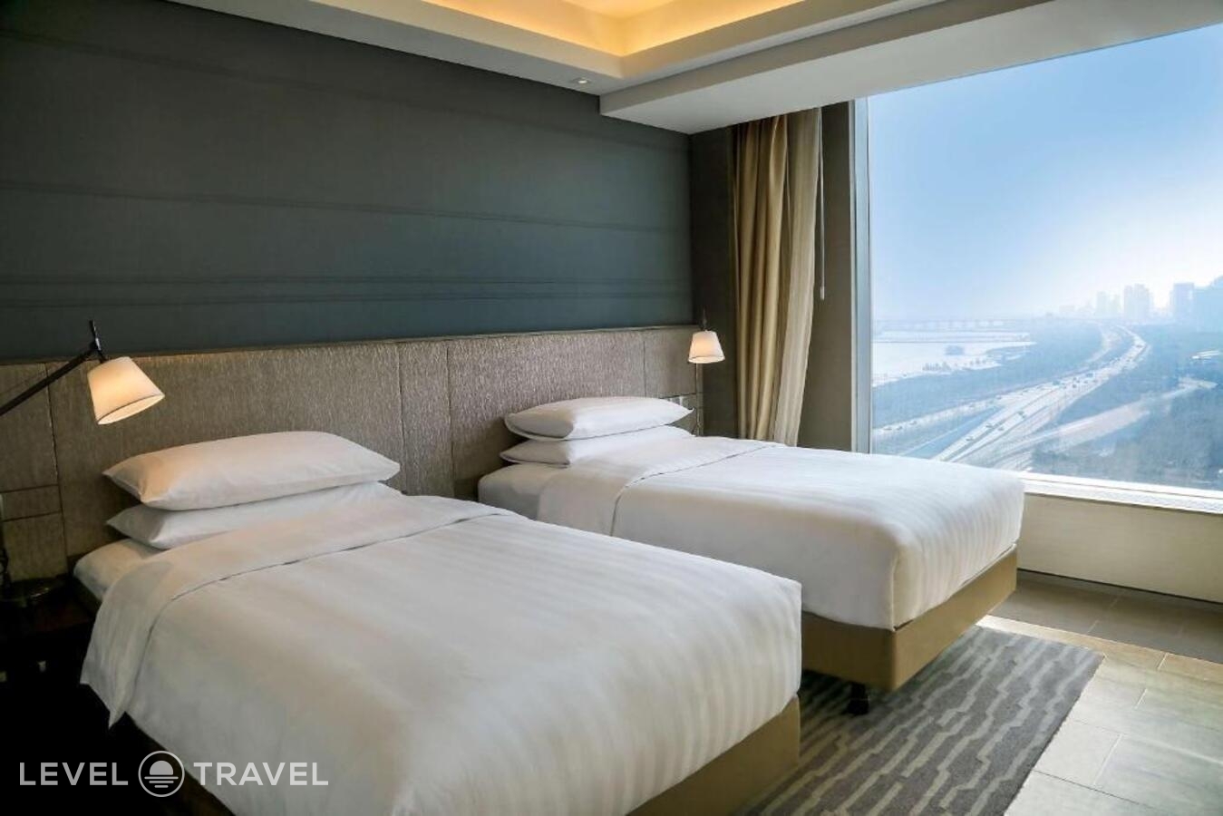 фотографии номера Двухместный номер Horizon Deluxe 2 отдельные кровати отеля Shangri-La Songbei, Harbin в Китай(Харбин) - фото №1