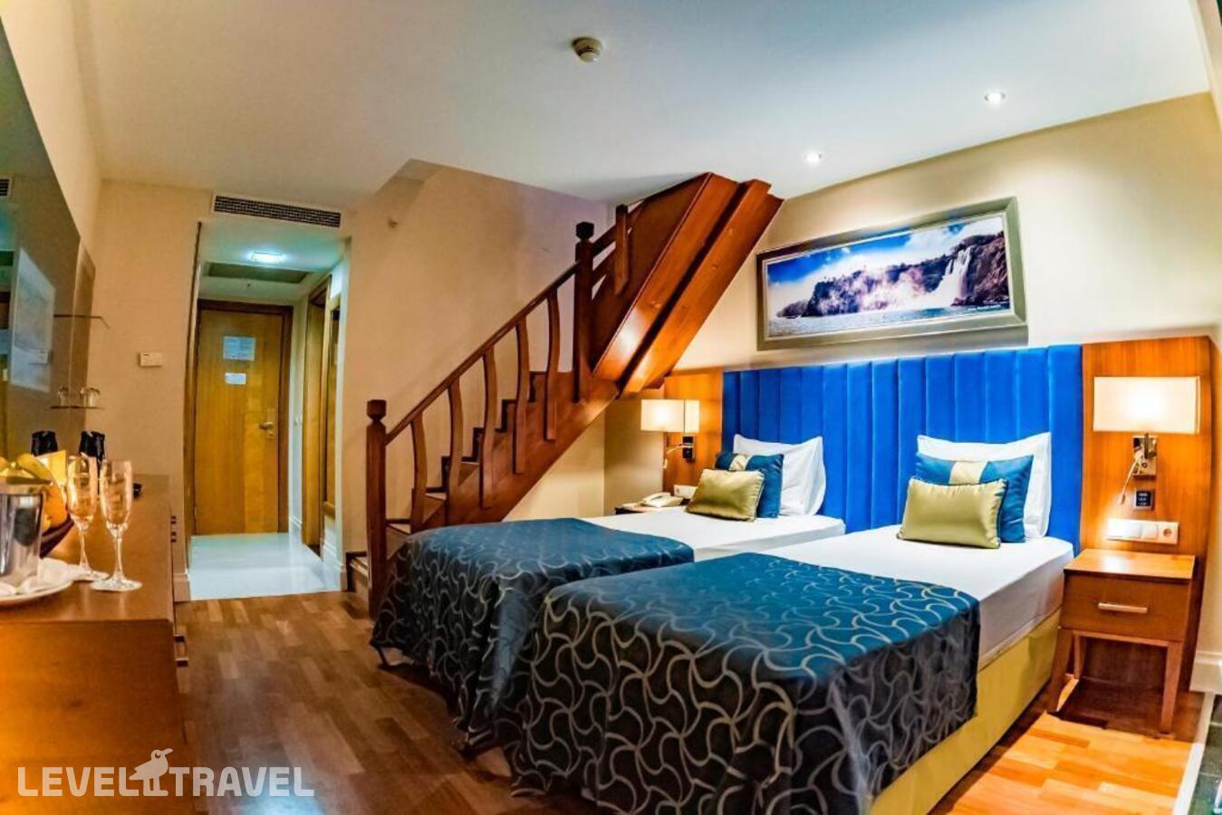фотографии номера Двухуровневый номер отеля Liberty Hotels Lara Beach (Ex. Hotel Lara Beach) в Турция(Лара) - фото №21