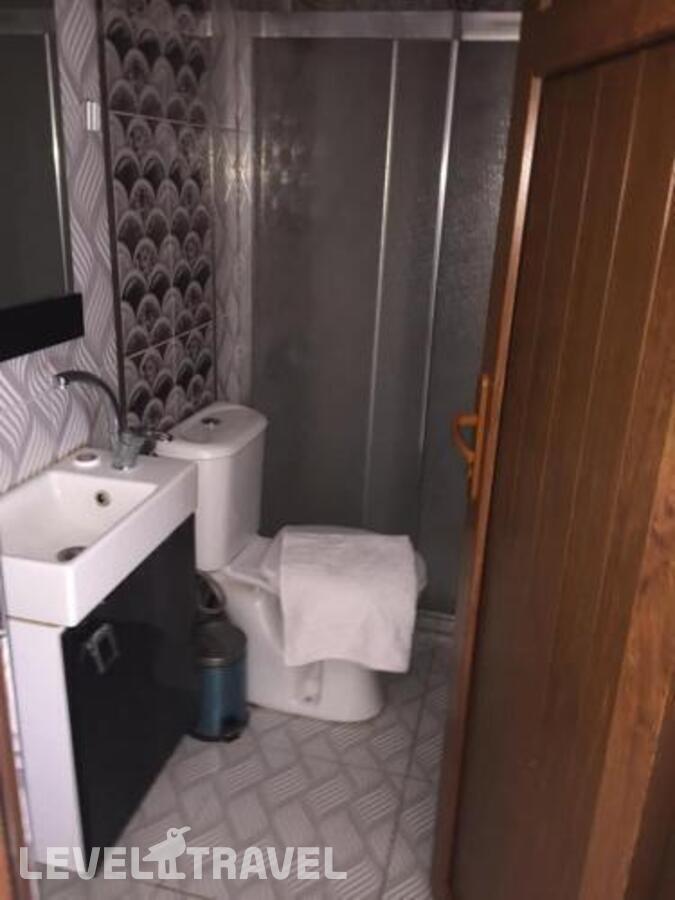 фотографии номера Трехместный номер отеля Ozgur Hotel в Турция(Анталья - Центр) - фото №2