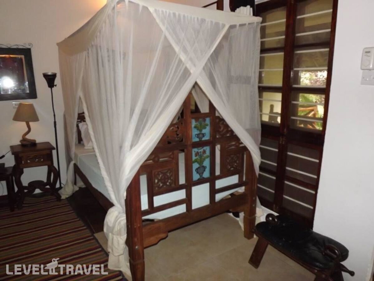 фотографии номера Стандартный номер отеля Langi Langi Beach Bungalows в Танзания(Нунгви Бич) - фото №15