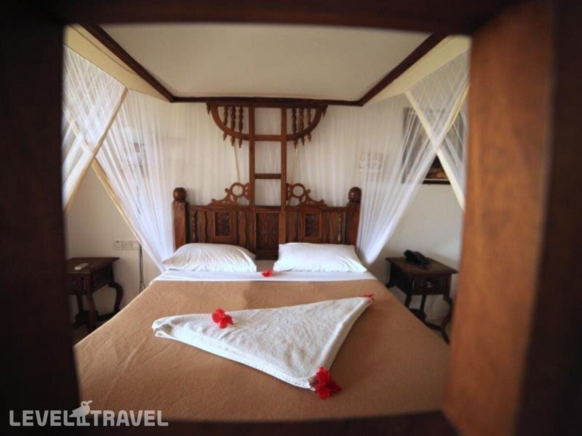 фотографии номера Стандартный номер отеля Langi Langi Beach Bungalows в Танзания(Нунгви Бич) - фото №14