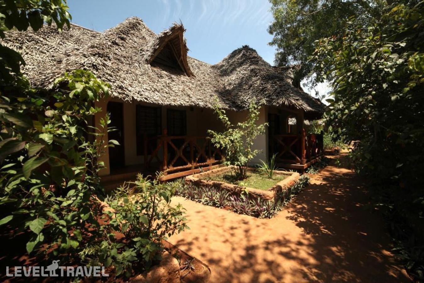 фотографии номера Стандартный номер отеля Langi Langi Beach Bungalows в Танзания(Нунгви Бич) - фото №1