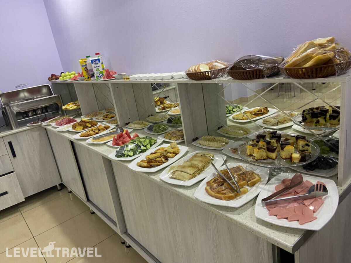 фотографии номера Улучшенный (две односпальные кровати) отеля Grand Shosh в Узбекистан(Ташкент) - фото №2