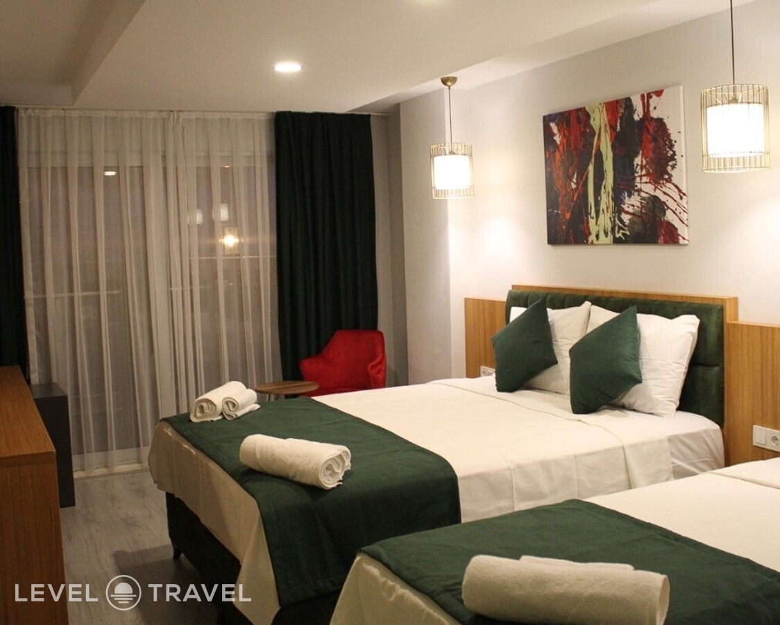 фотографии номера Трехместный номер отеля Mogons Exclusive Hotel в Турция(Калкан) - фото №1
