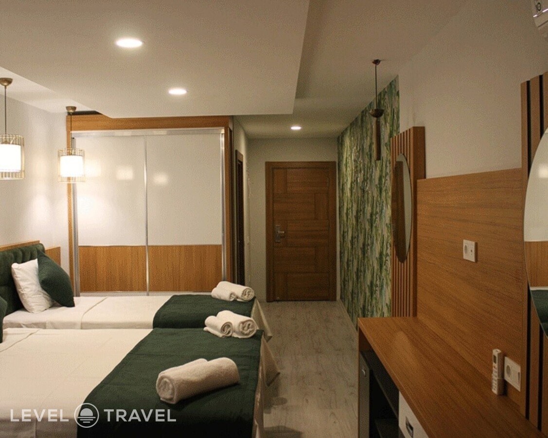 фотографии номера Трехместный номер отеля Mogons Exclusive Hotel в Турция(Калкан) - фото №2