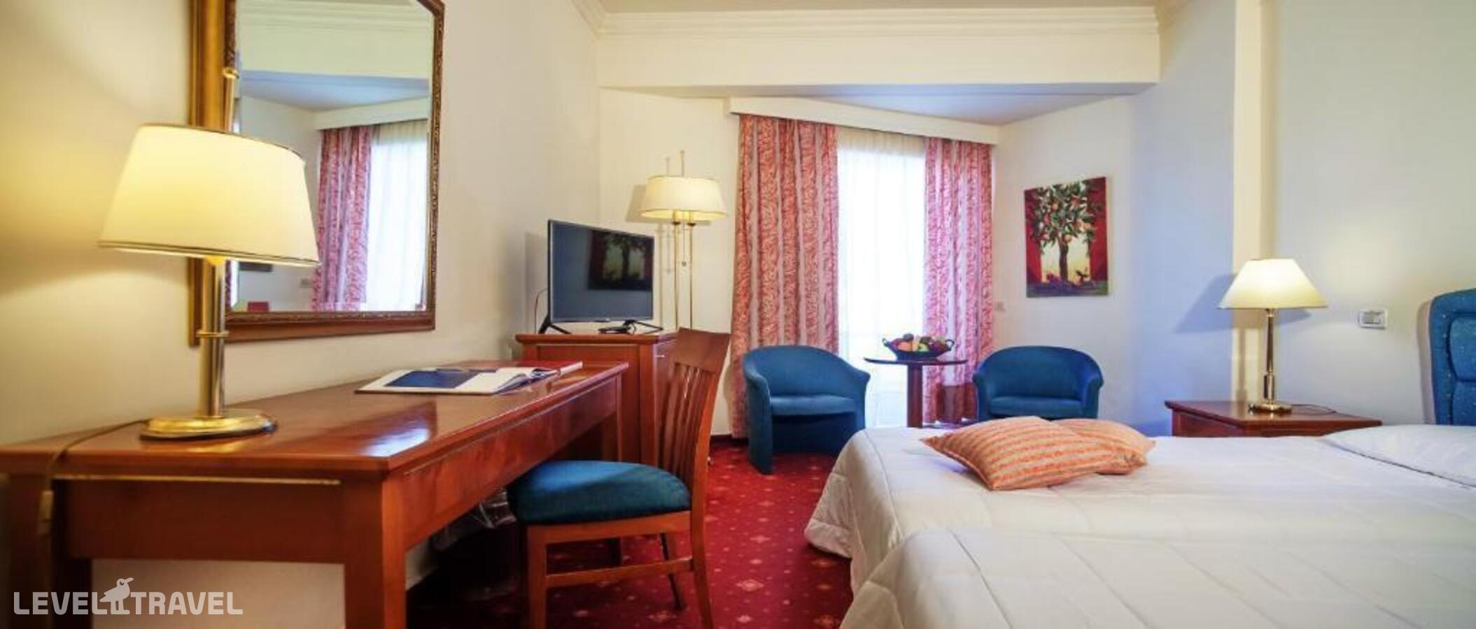 фотографии номера Стандартный номер отеля Porto Rio Hotel & Casino в Греция(Ахайа) - фото №6