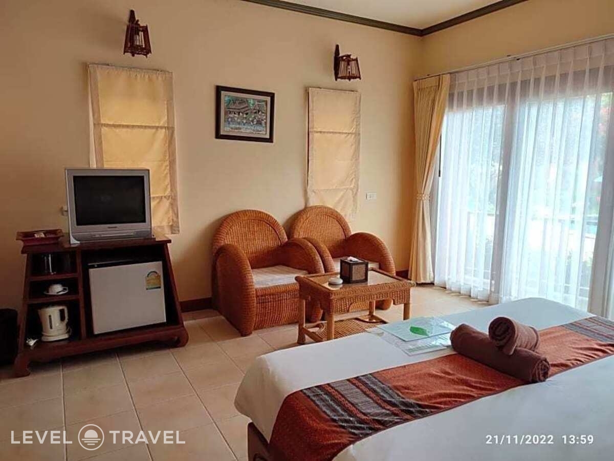 фотографии номера Номер Deluxe с балконом и с видом на бассейн отеля Andamanee Boutique Resort в Таиланд(Ноппарат Тара) - фото №1