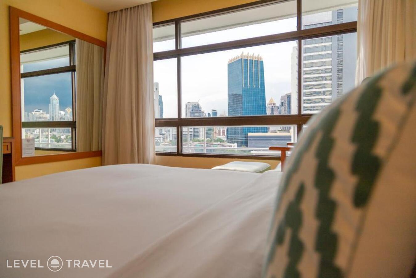 фотографии номера Двухместный номер Pinnacle двуспальная кровать отеля Pinnacle Lumpinee Park Hotel в Таиланд(Бангкок) - фото №3