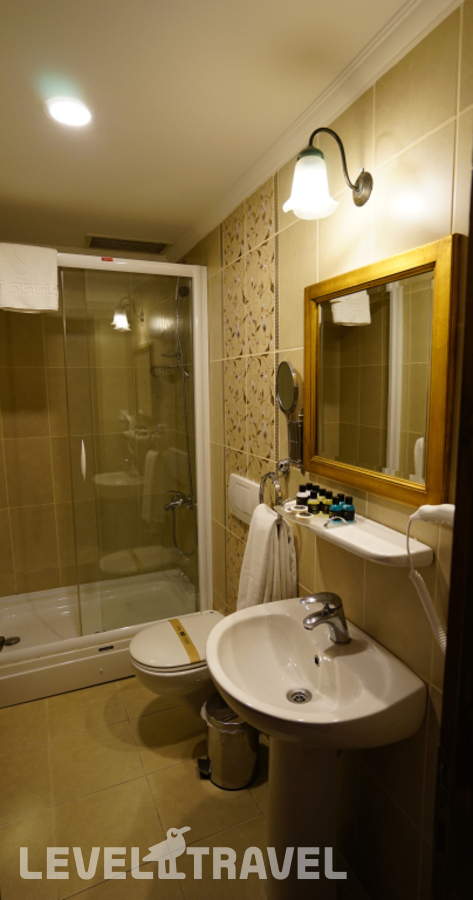 фотографии номера Трёхместный номер отеля Yusufpasa Konagi Hotel в Турция(Фатих) - фото №2