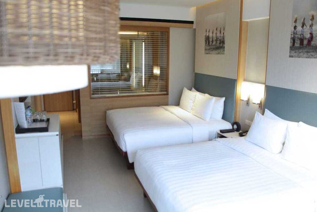 фотографии номера Семейный с видом на город отеля Courtyard By Marriott Bali Seminyak в Индонезия(Семиньяк) - фото №1