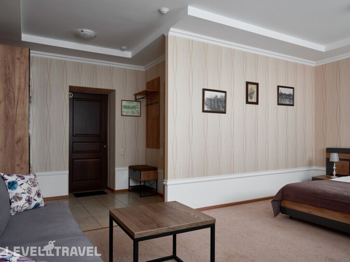 фотографии номера Трёхместный номер Comfort с видом на город отеля Отель Сибирский Сафари Клуб в Россия(Красноярск) - фото №10