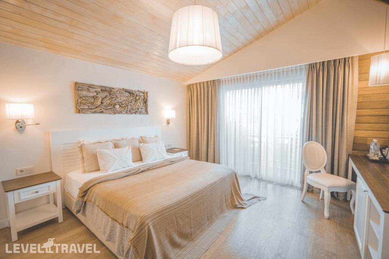 фотографии номера Двухместный номер Kumquat двуспальная кровать отеля Kimera Hotel в Турция(Чиралы) - фото №1