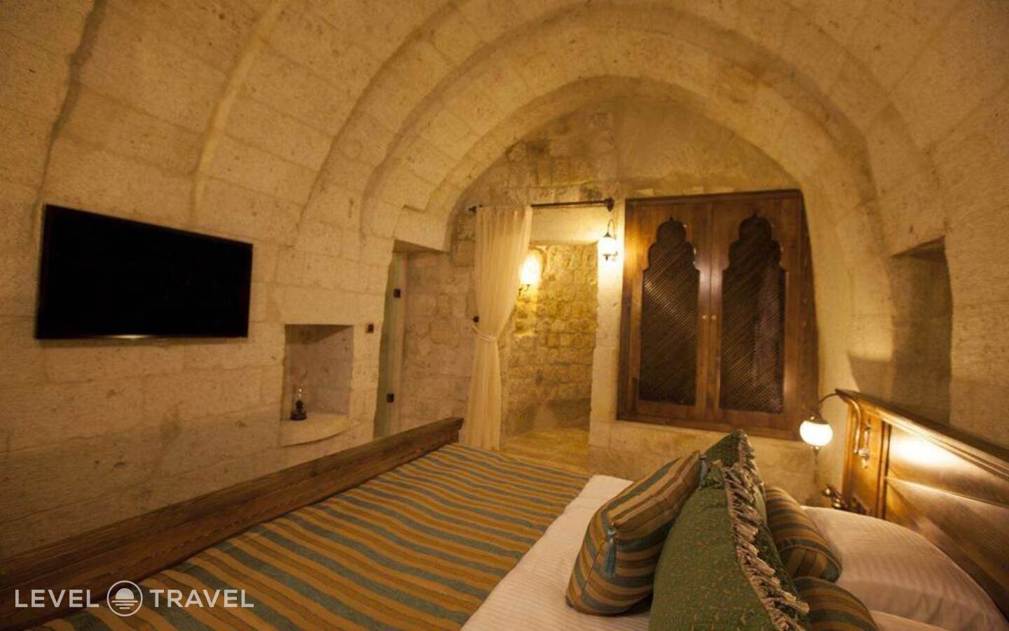 фотографии номера Двухместный люкс Glorious Cave двуспальная кровать отеля Kayakapi Premium Caves Cappadocia Hotel в Турция(Ургюп) - фото №2
