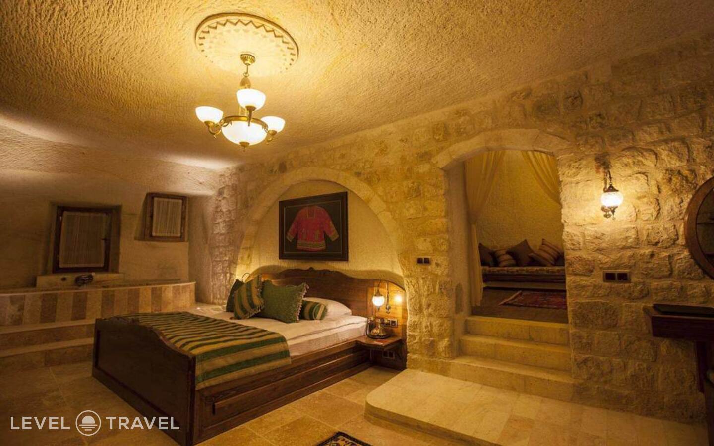фотографии номера Двухместный люкс Glorious Cave двуспальная кровать отеля Kayakapi Premium Caves Cappadocia Hotel в Турция(Ургюп) - фото №4