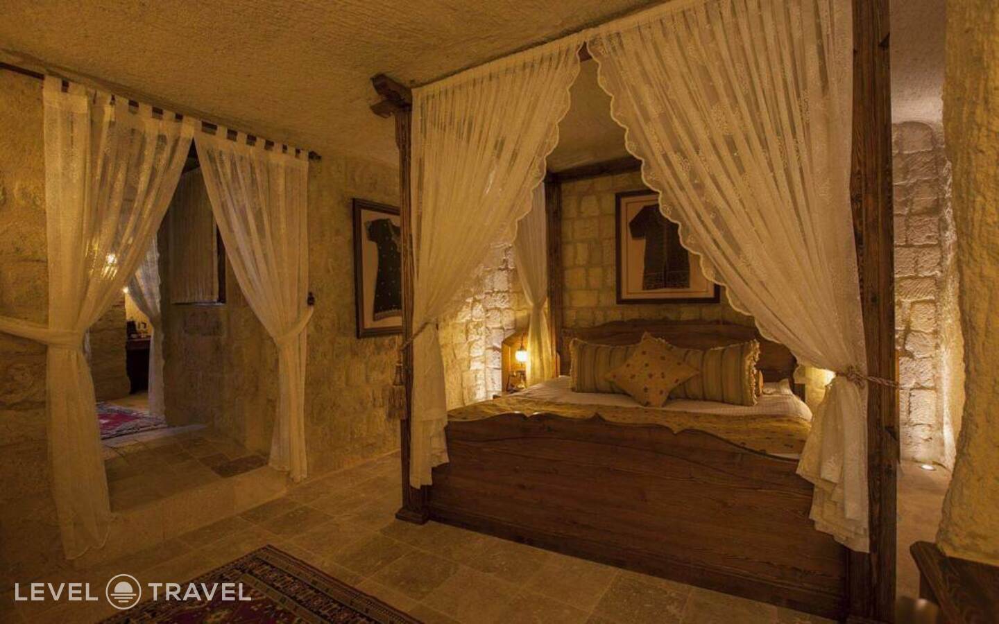 фотографии номера Двухместный люкс Glorious Cave двуспальная кровать отеля Kayakapi Premium Caves Cappadocia Hotel в Турция(Ургюп) - фото №3