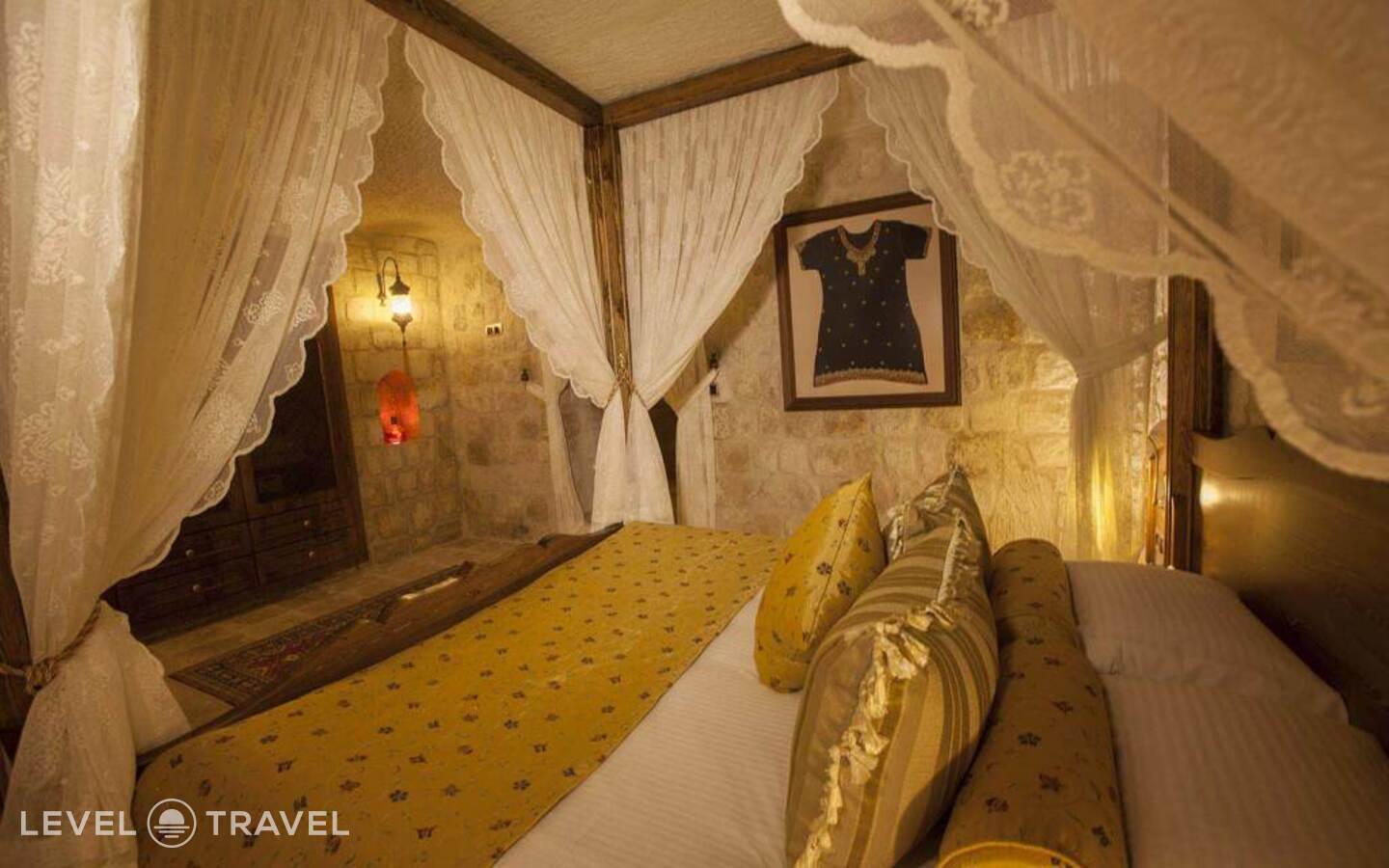 фотографии номера Двухместный люкс Glorious Cave двуспальная кровать отеля Kayakapi Premium Caves Cappadocia Hotel в Турция(Ургюп) - фото №1