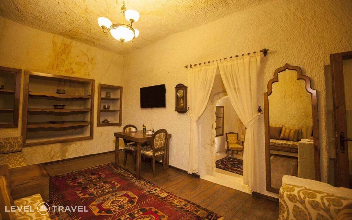 фотографии номера Двухместный люкс Glorious Cave двуспальная кровать отеля Kayakapi Premium Caves Cappadocia Hotel в Турция(Ургюп) - фото №15