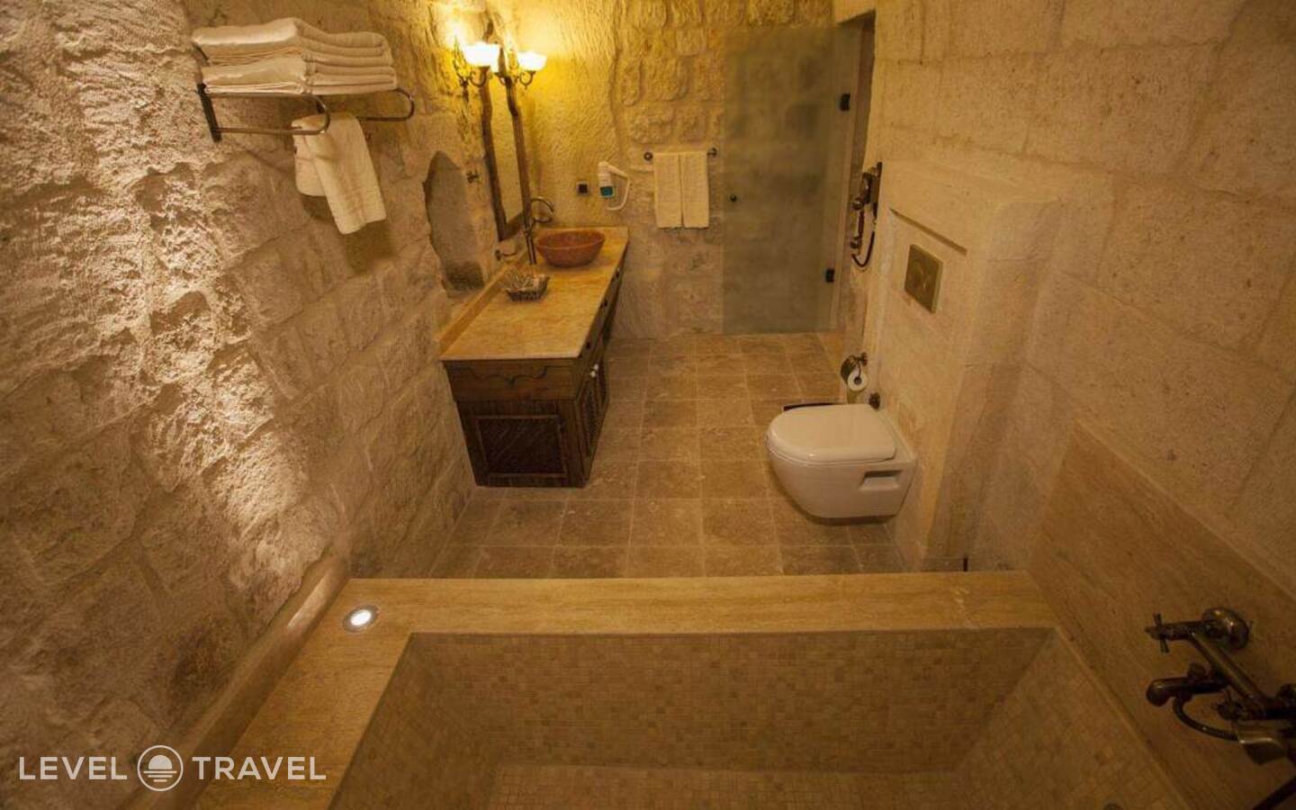фотографии номера Двухместный люкс Glorious Cave двуспальная кровать отеля Kayakapi Premium Caves Cappadocia Hotel в Турция(Ургюп) - фото №6