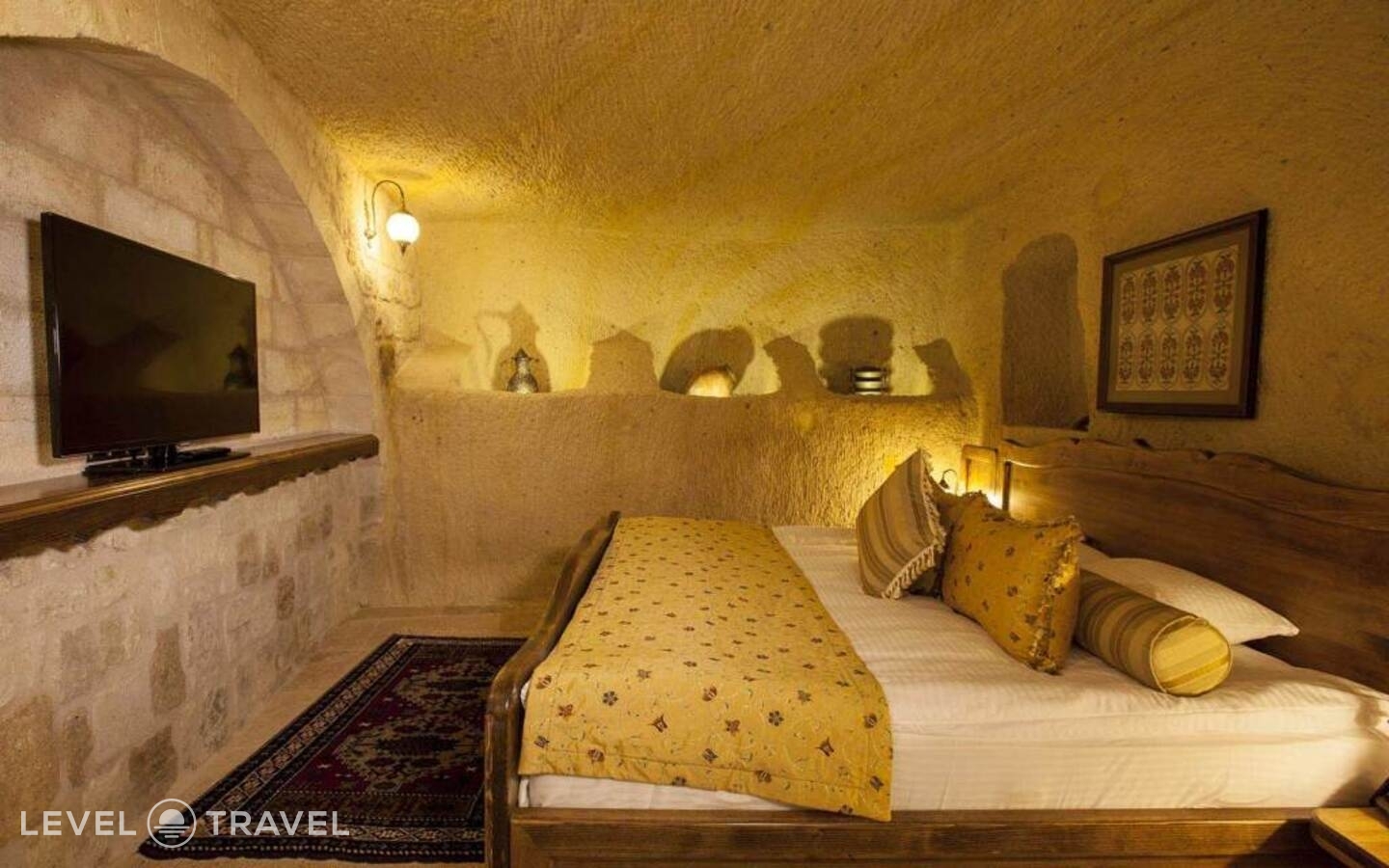 фотографии номера Двухместный люкс Majestic Cave двуспальная кровать отеля Kayakapi Premium Caves Cappadocia Hotel в Турция(Ургюп) - фото №6