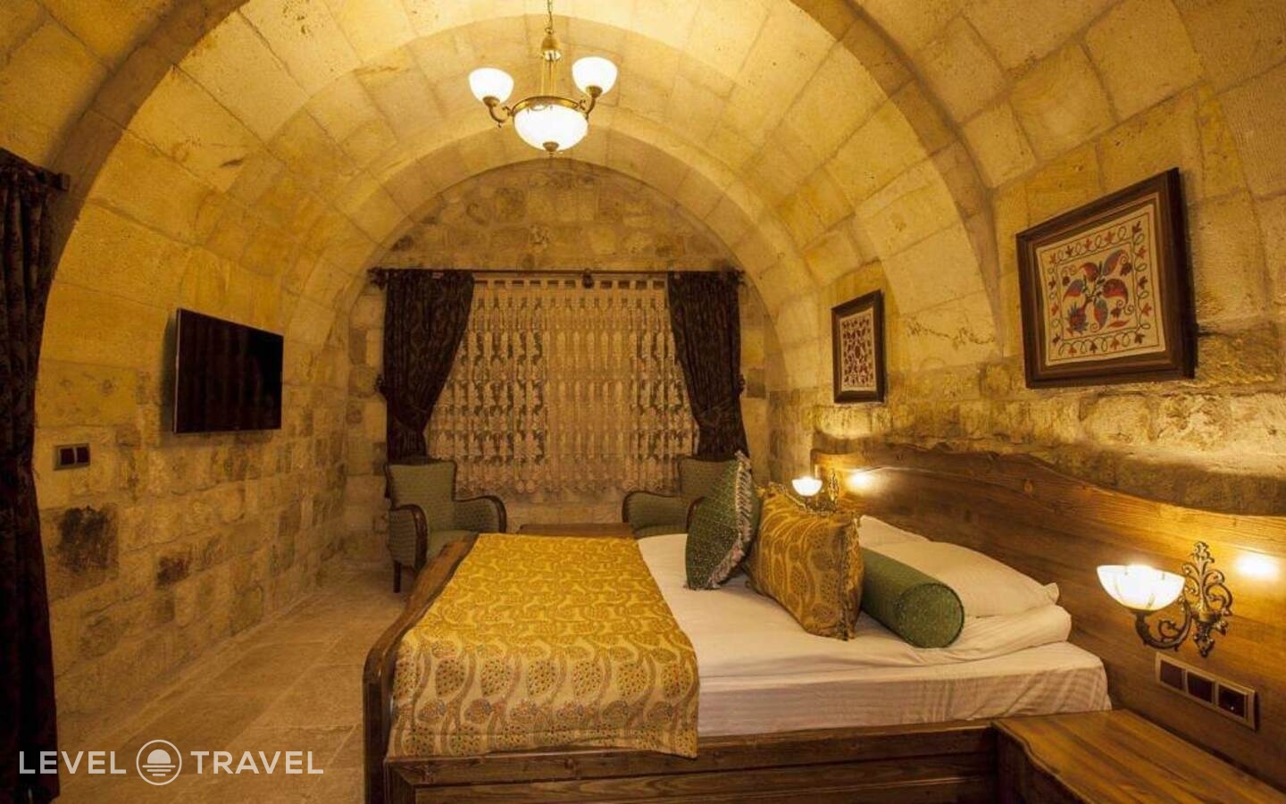 фотографии номера Двухместный люкс Majestic Cave двуспальная кровать отеля Kayakapi Premium Caves Cappadocia Hotel в Турция(Ургюп) - фото №5