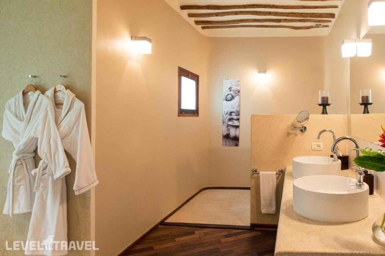 фотографии номера Люкс с видом на сад отеля Essque Zalu Hotel в Танзания(Нунгви Бич) - фото №4