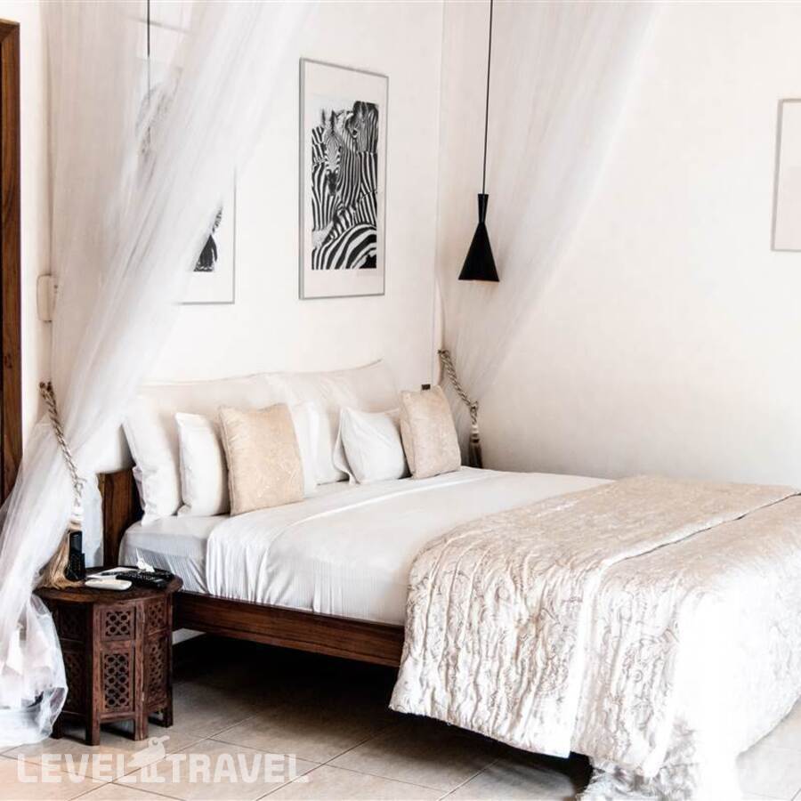 фотографии номера Четырехместный Cinnamon отеля White Sand Luxury Villa в Танзания(Паже) - фото №2