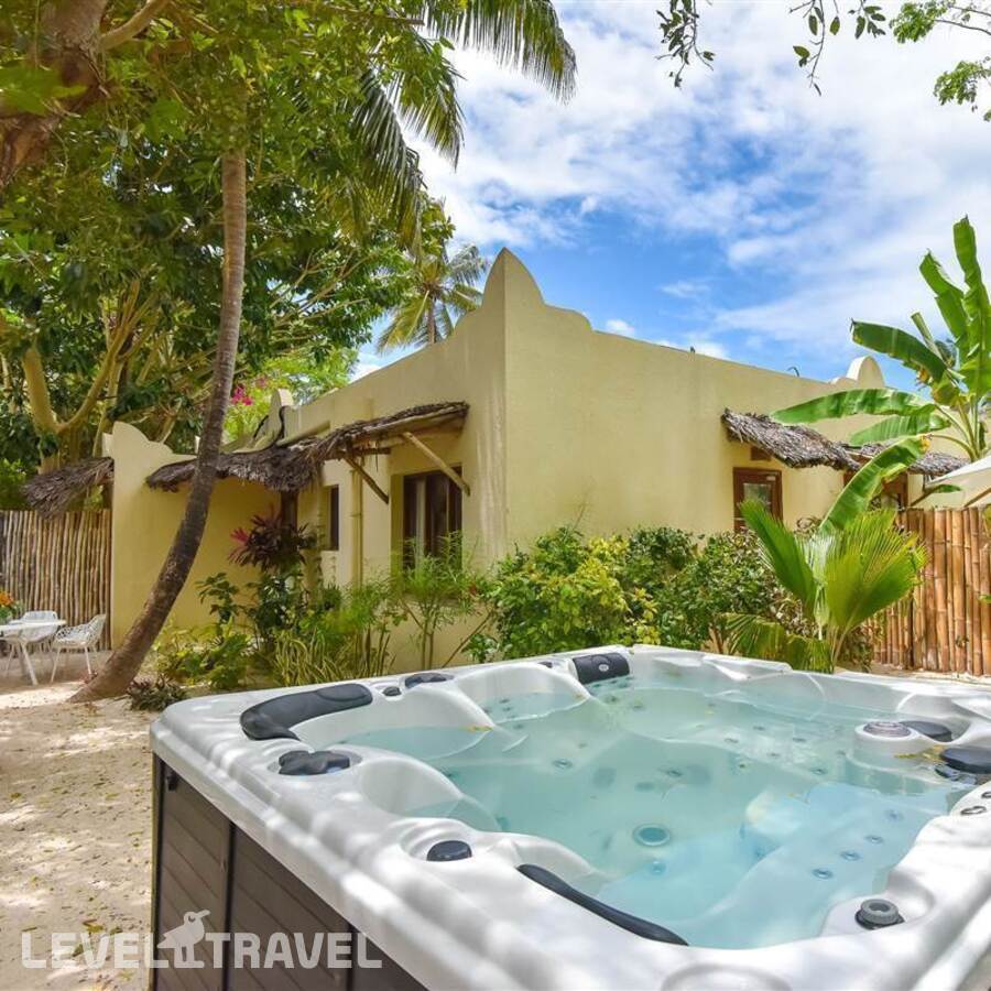 фотографии номера Семейный Cinnamon отеля White Sand Luxury Villa в Танзания(Паже) - фото №6