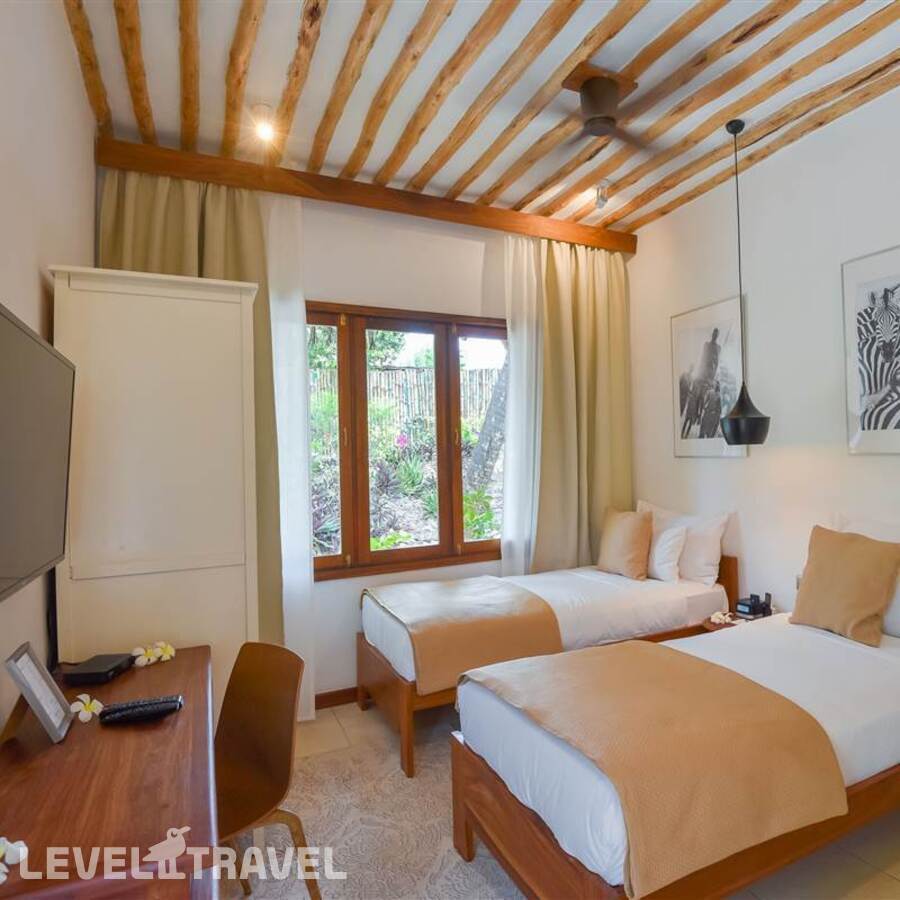 фотографии номера Семейный Cinnamon отеля White Sand Luxury Villa в Танзания(Паже) - фото №5