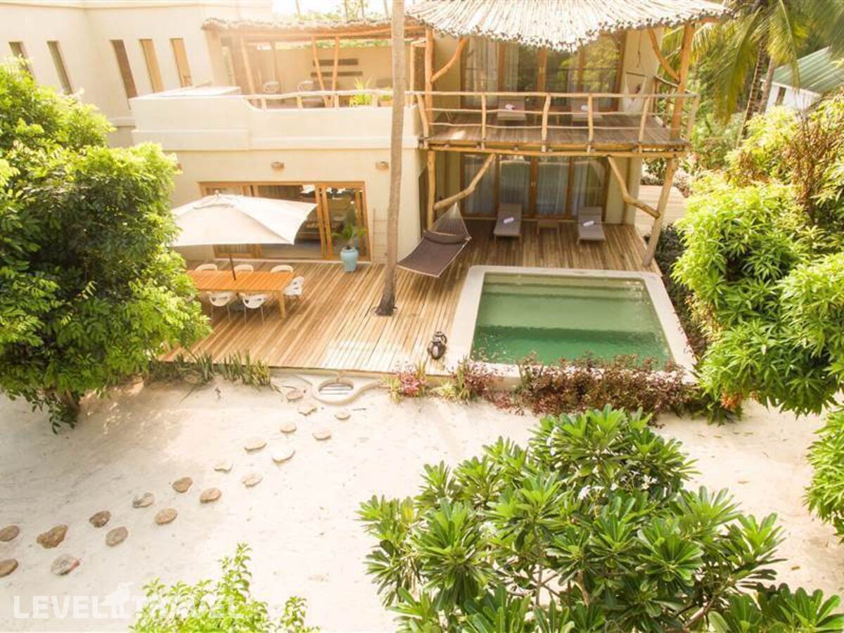 фотографии номера Семейный делюкс с бассейном отеля White Sand Luxury Villa в Танзания(Паже) - фото №1