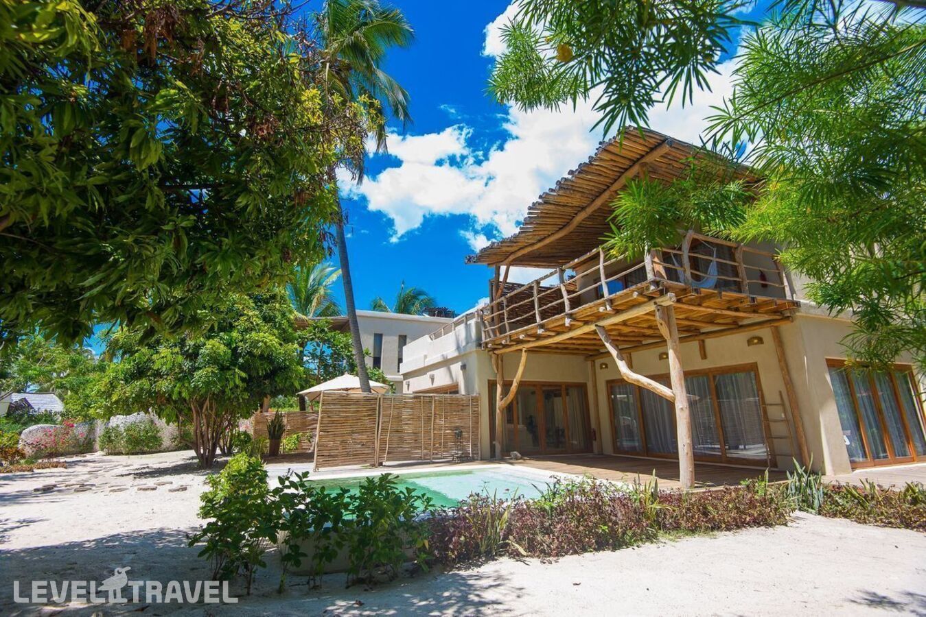фотографии номера Семейный делюкс с бассейном отеля White Sand Luxury Villa в Танзания(Паже) - фото №5