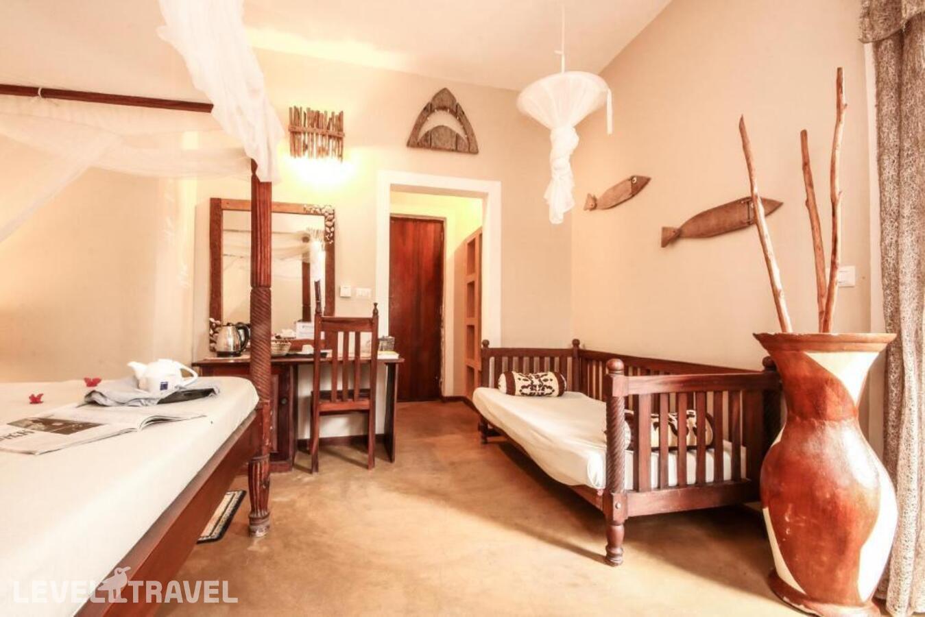 фотографии номера Стандартный с видом на сад отеля Sahari Zanzibar Beach Hotel Resort в Танзания(Бведжу) - фото №52