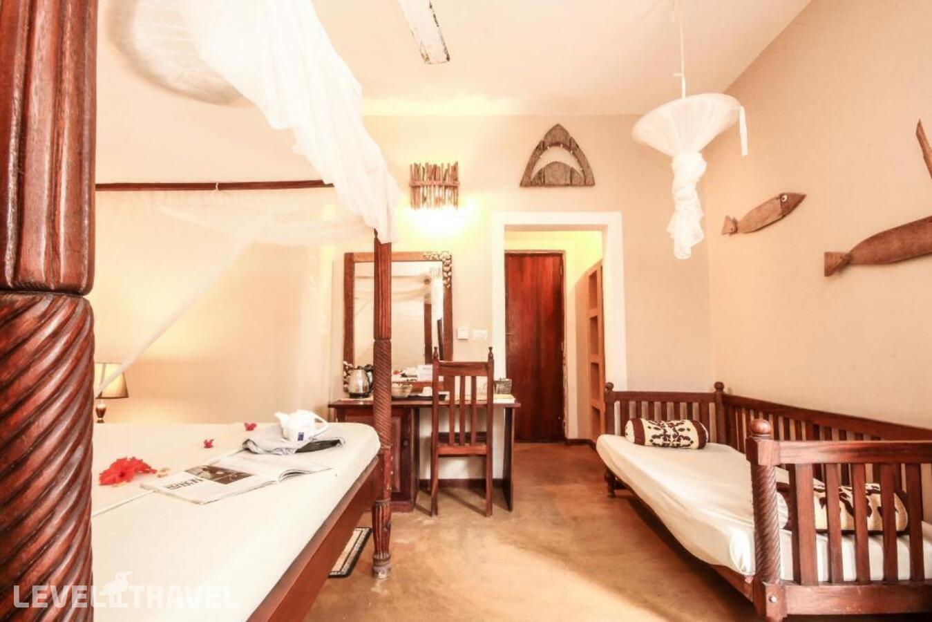 фотографии номера Стандартный с видом на сад отеля Sahari Zanzibar Beach Hotel Resort в Танзания(Бведжу) - фото №58