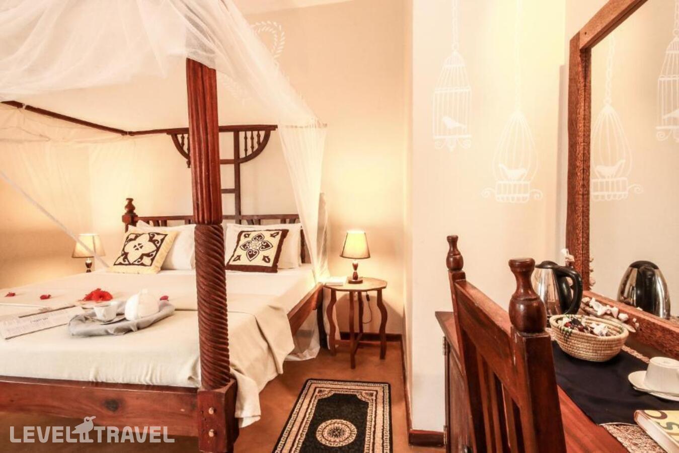 фотографии номера Стандартный с видом на сад отеля Sahari Zanzibar Beach Hotel Resort в Танзания(Бведжу) - фото №51