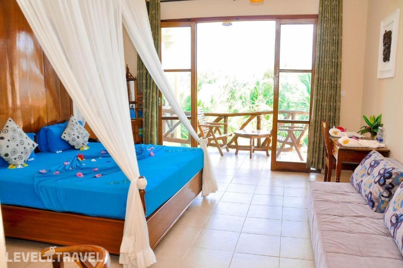 фотографии номера Бунгало делюкс отеля Sunset Bungalows в Танзания(Кендва Бич) - фото №1