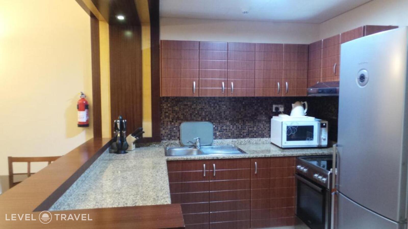 фотографии номера Двухместные апартаменты Executive двуспальная кровать отеля Xclusive Maples Hotel Apartments в ОАЭ(Бар Дубай) - фото №11