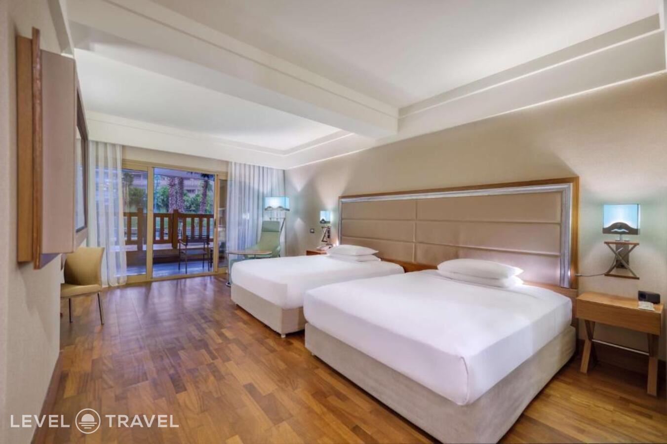 фотографии номера Делюкс (две односпальные кровати) отеля Hilton Dalaman Sarigerme Resort & Spa в Турция(Саригерме) - фото №1