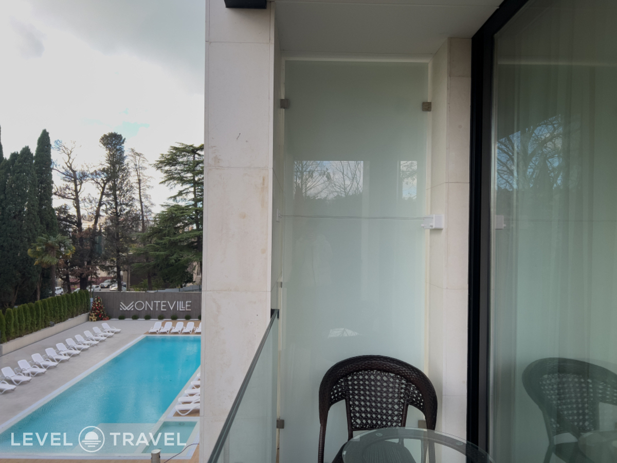 фотографии номера Делюкс с балконом отеля Апарт-Отель Монтевиль by Adamand Resort в Россия(Сочи - Центр) - фото №4