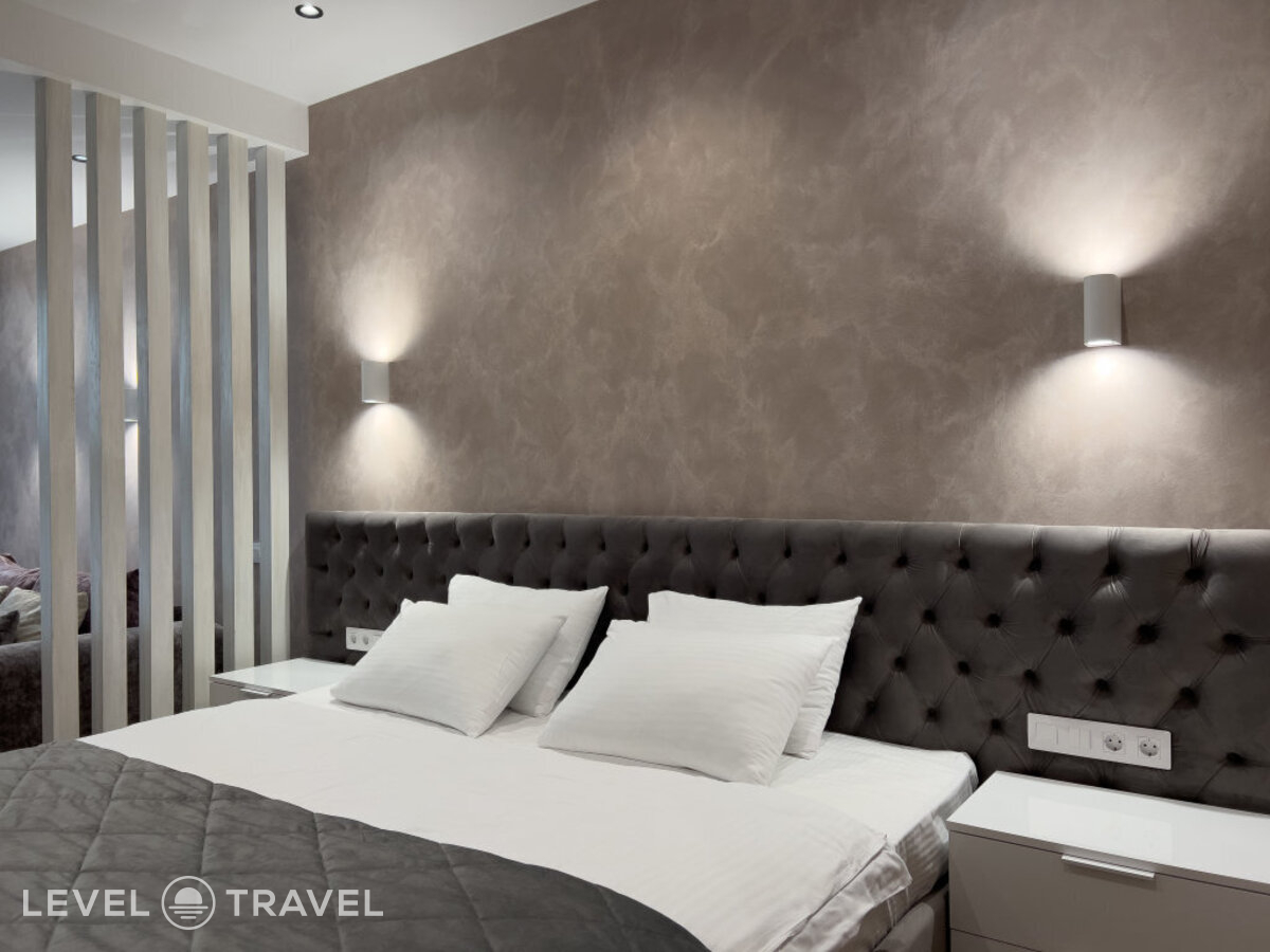 фотографии номера Делюкс с балконом отеля Апарт-Отель Монтевиль by Adamand Resort в Россия(Сочи - Центр) - фото №1