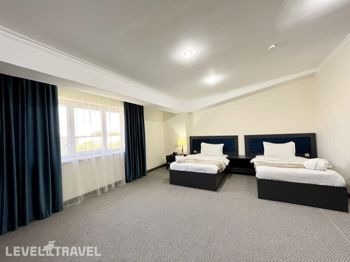 фотографии номера Стандартный (две односпальные кровати) отеля Grand Erbil Hotel в Казахстан(Алматы) - фото №5