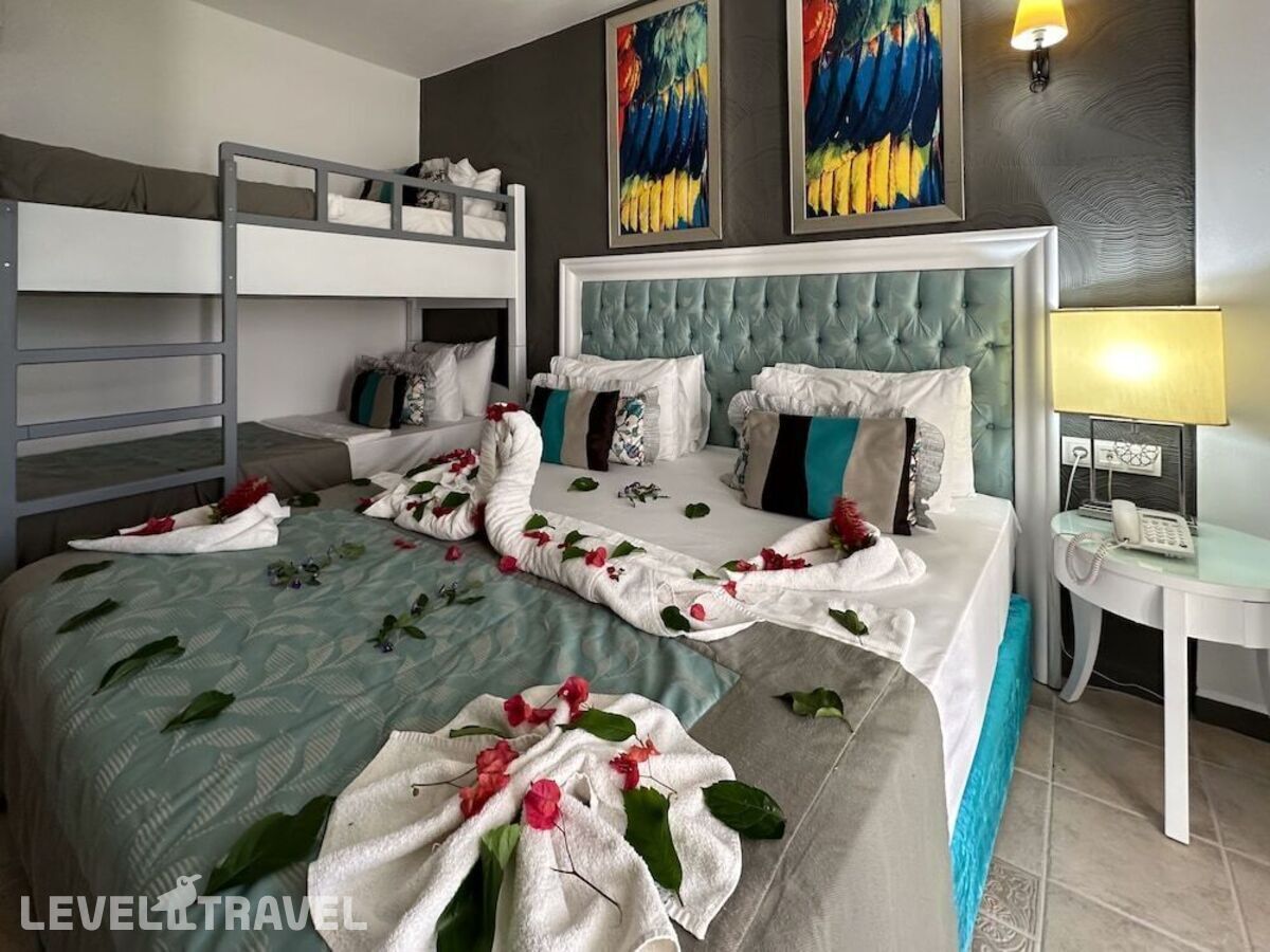 фотографии номера Стандартный (двухъярусная кровать) отеля Tiana Beach Hotel в Турция(Кадикале) - фото №1