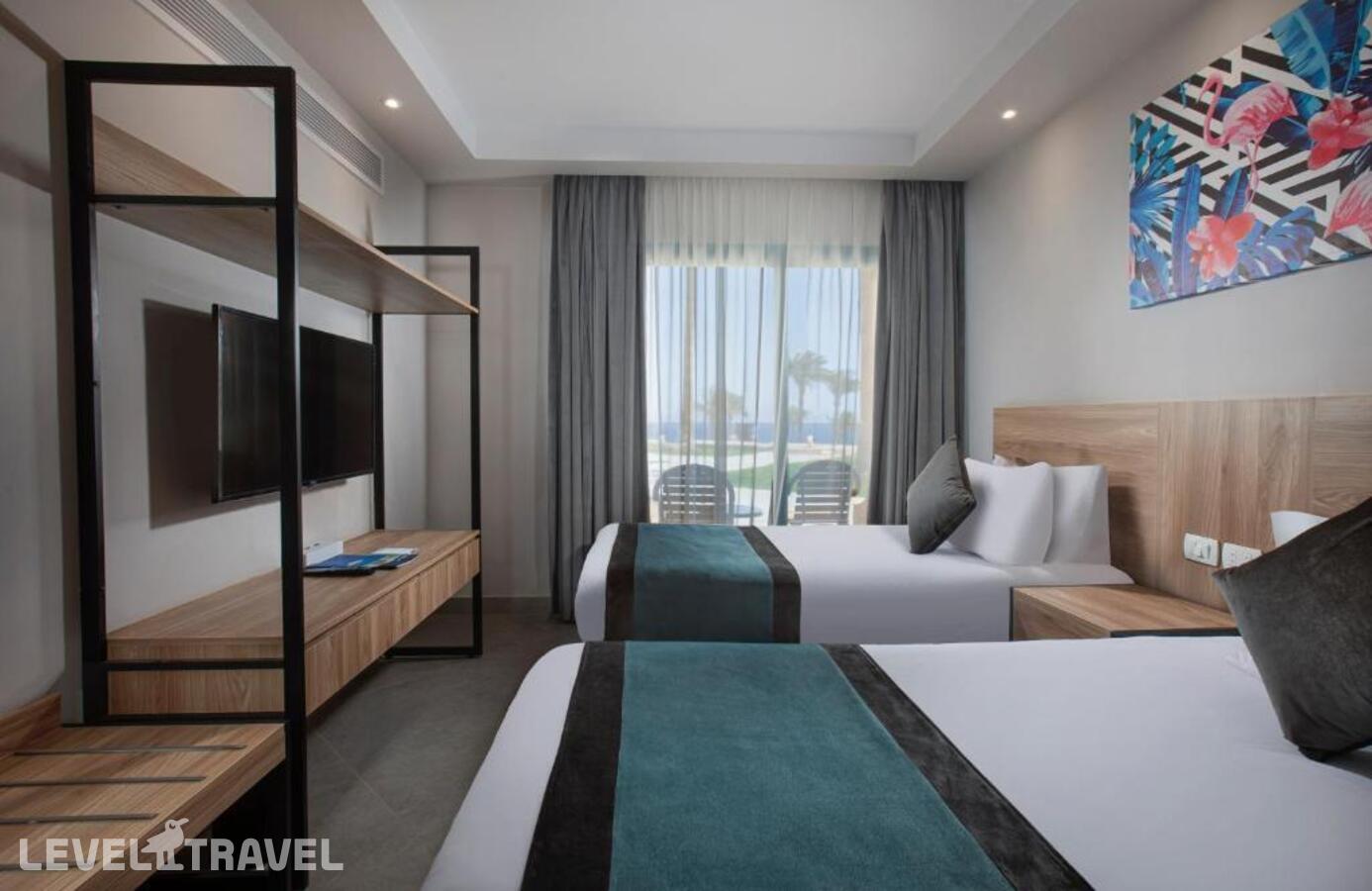 фотографии номера Семейный номер отеля V Hotel - Sharm El Sheikh (Ex. Pyramisa Beach Resort) в Египет(Шаркс Бэй) - фото №1