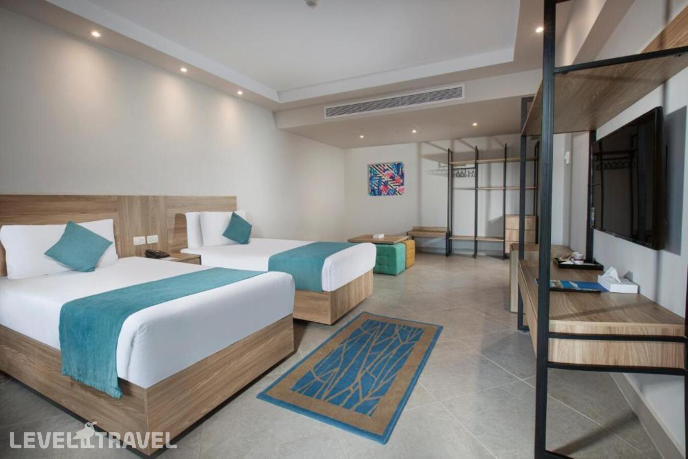 фотографии номера Семейный номер отеля V Hotel - Sharm El Sheikh (Ex. Pyramisa Beach Resort) в Египет(Шаркс Бэй) - фото №5