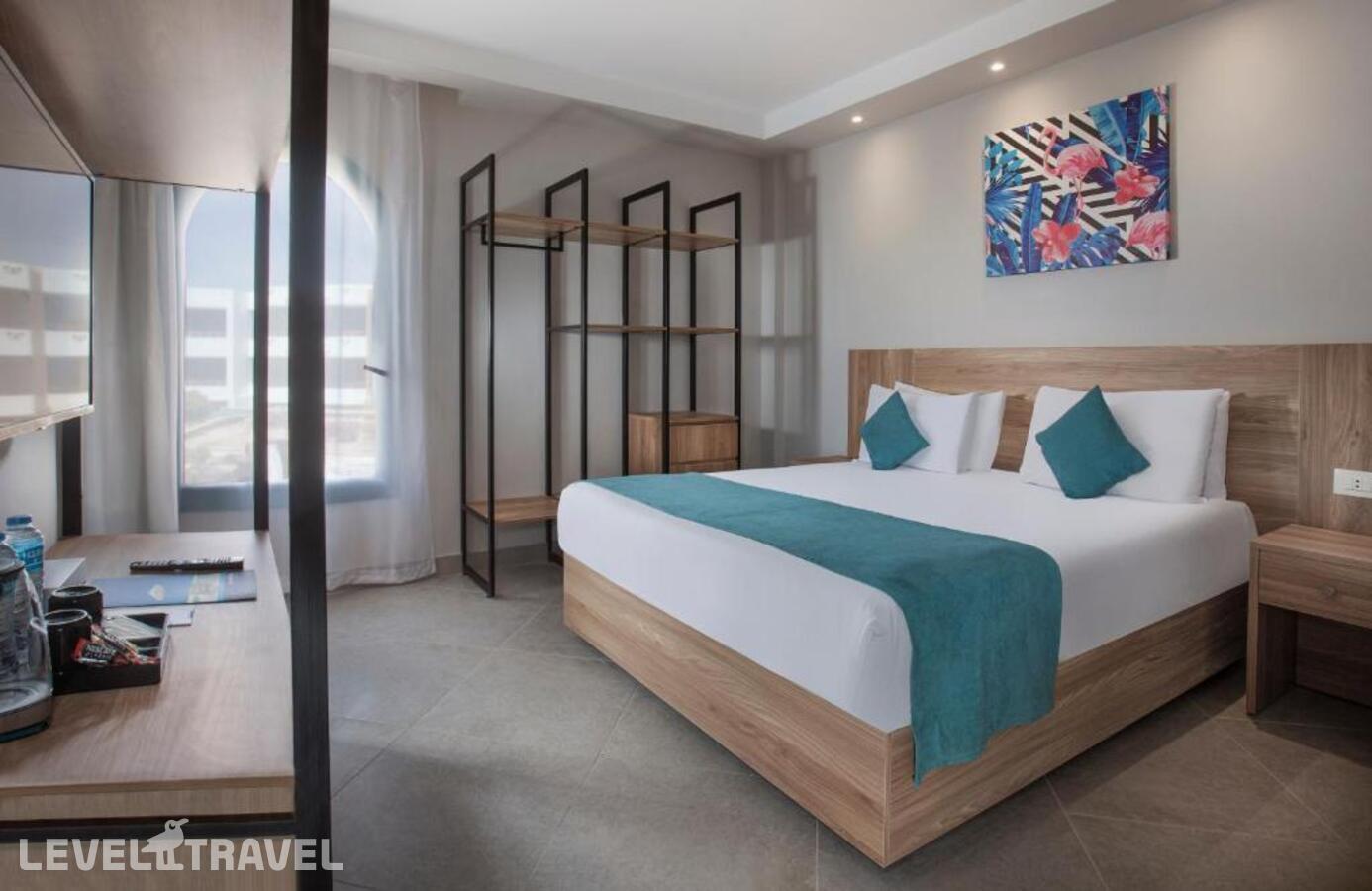 фотографии номера Семейный номер отеля V Hotel - Sharm El Sheikh (Ex. Pyramisa Beach Resort) в Египет(Шаркс Бэй) - фото №7