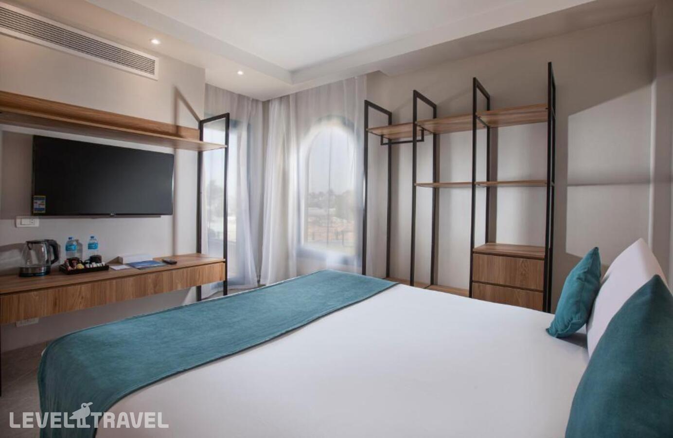 фотографии номера Семейный номер отеля V Hotel - Sharm El Sheikh (Ex. Pyramisa Beach Resort) в Египет(Шаркс Бэй) - фото №6