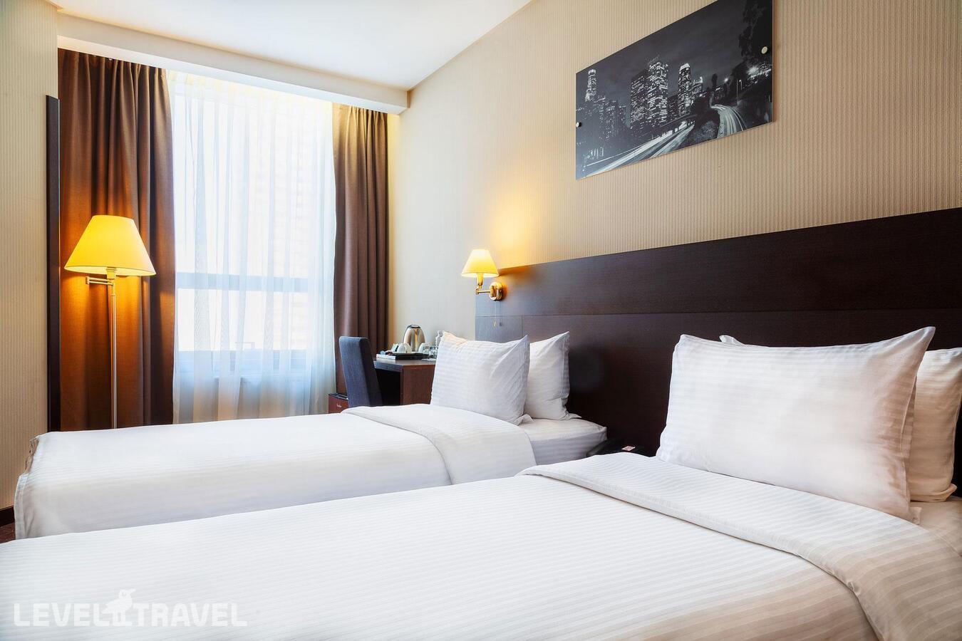 фотографии номера Номер бизнес (две односпальные кровати) отеля Gorskiy City Hotel в Россия(Новосибирск) - фото №3