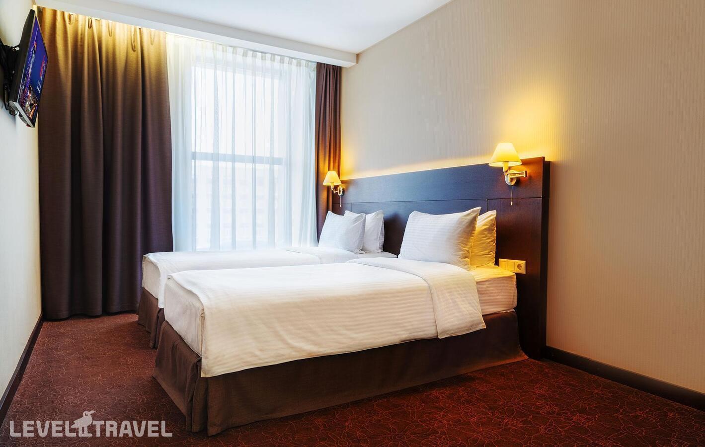 фотографии номера Номер бизнес (две односпальные кровати) отеля Gorskiy City Hotel в Россия(Новосибирск) - фото №2